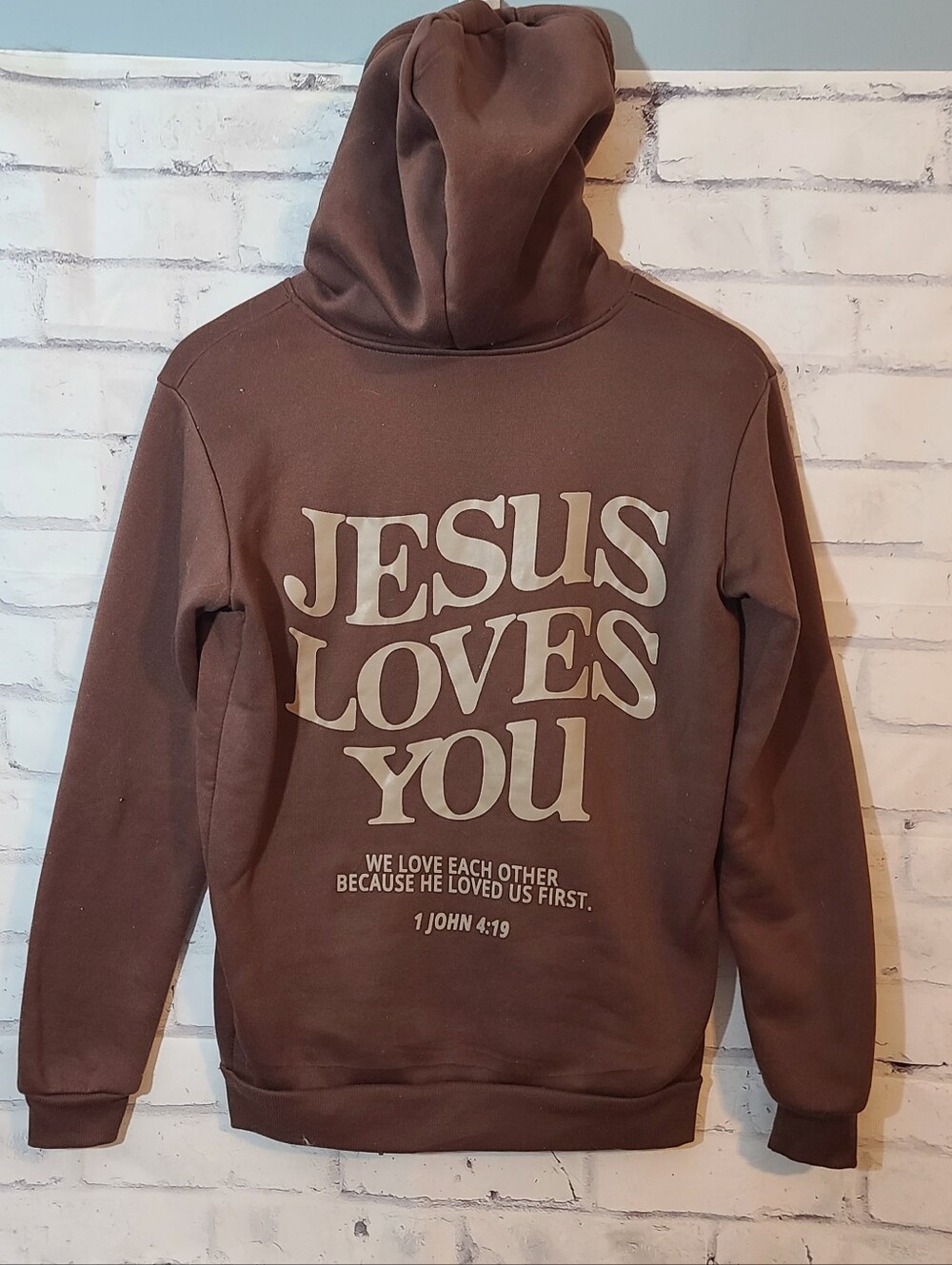 Brown Jesus Loves You 1 John 4:19 Graphic Print Pullover Hoodie w/ Pockets S